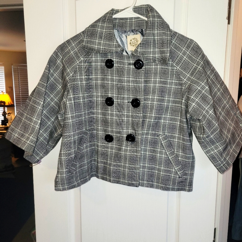 Women's size medium short plaid pattern blazer in like new condition